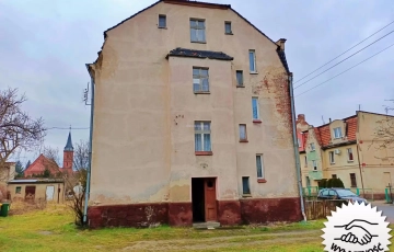 Zdjęcie główne ogłoszenia Sprzedaż Lokalu mieszkalnego na I piętrze w Malczycach wraz z przynależnymi budynkami gospodarczymi.