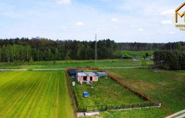 Zdjęcie główne ogłoszenia Atrakcyjna działka z rozpoczętą budową domu